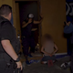 LAPS guards take two suspected trespassers into custody.